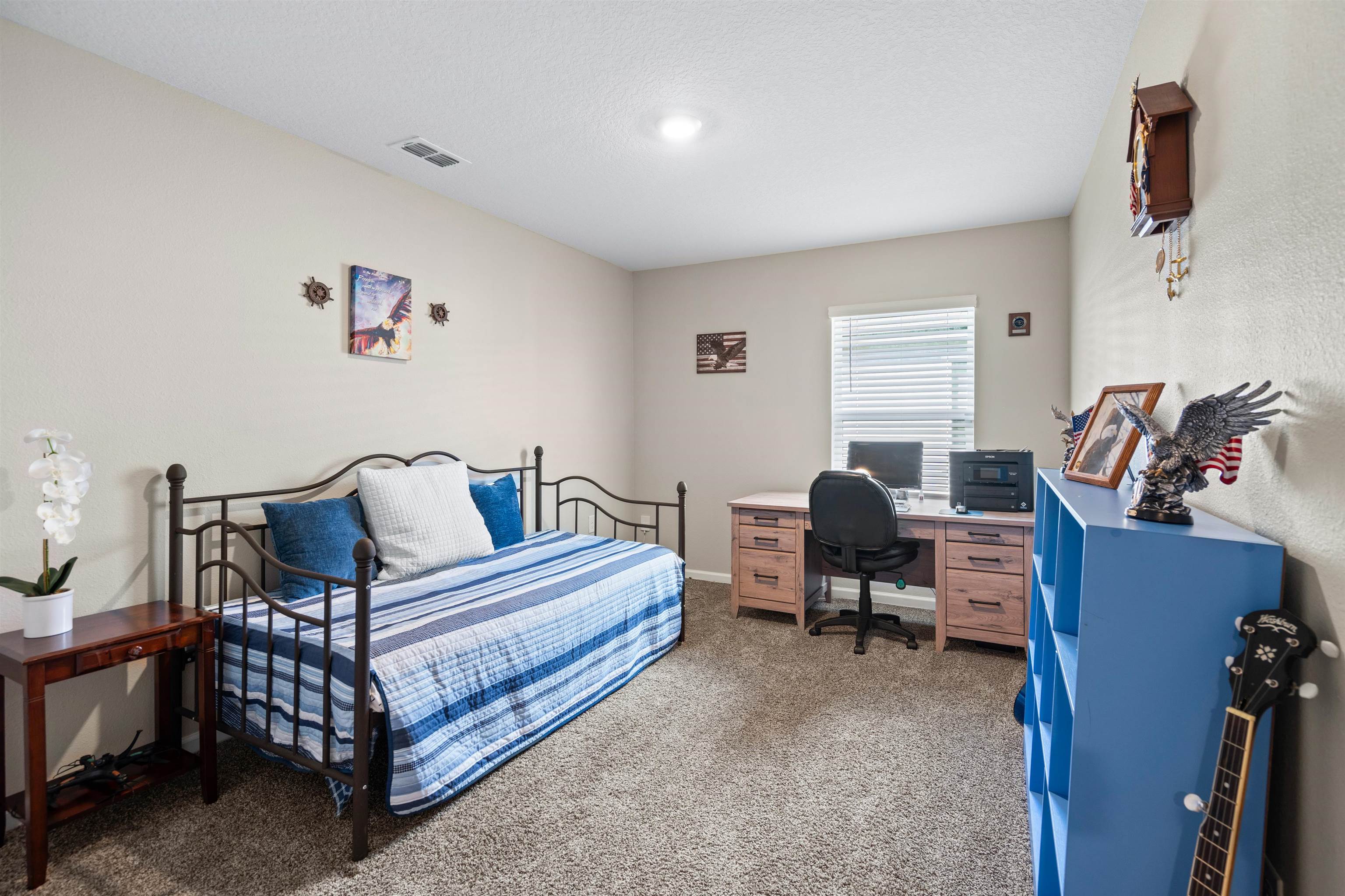 408 Falcon Ridge Road St. Augustine, FL 32084 - Photo 22 of 26 a living room with furniture and a chair