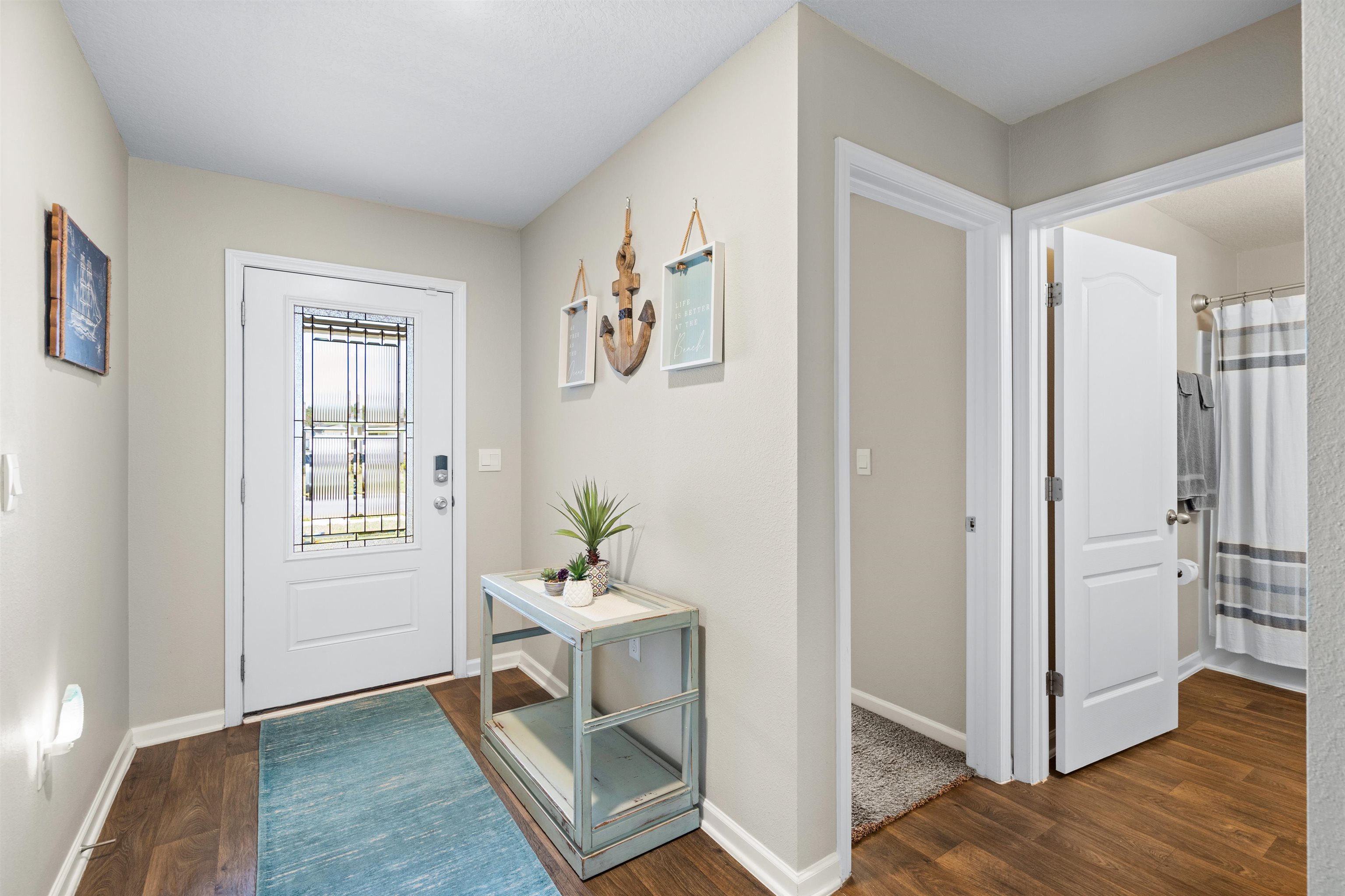 408 Falcon Ridge Road St. Augustine, FL 32084 - Photo 4 of 26 a view of livingroom with furniture and wooden floor