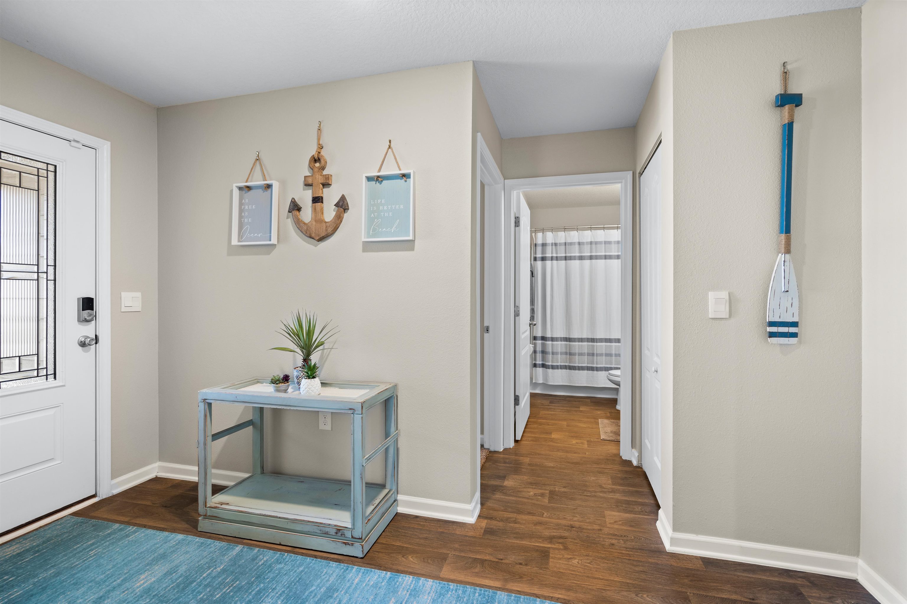 408 Falcon Ridge Road St. Augustine, FL 32084 - Photo 5 of 26 a view of livingroom with hardwood floor and hallway