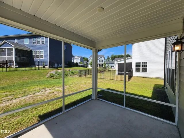 a view of swimming pool with seating area