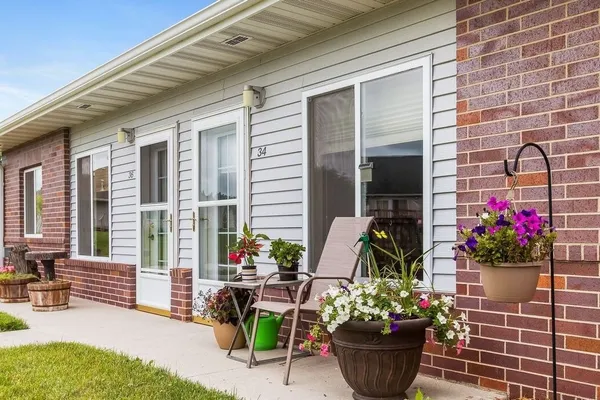 a room with furniture and flowers