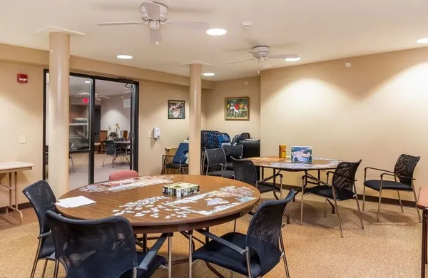 a view of a dining room with furniture
