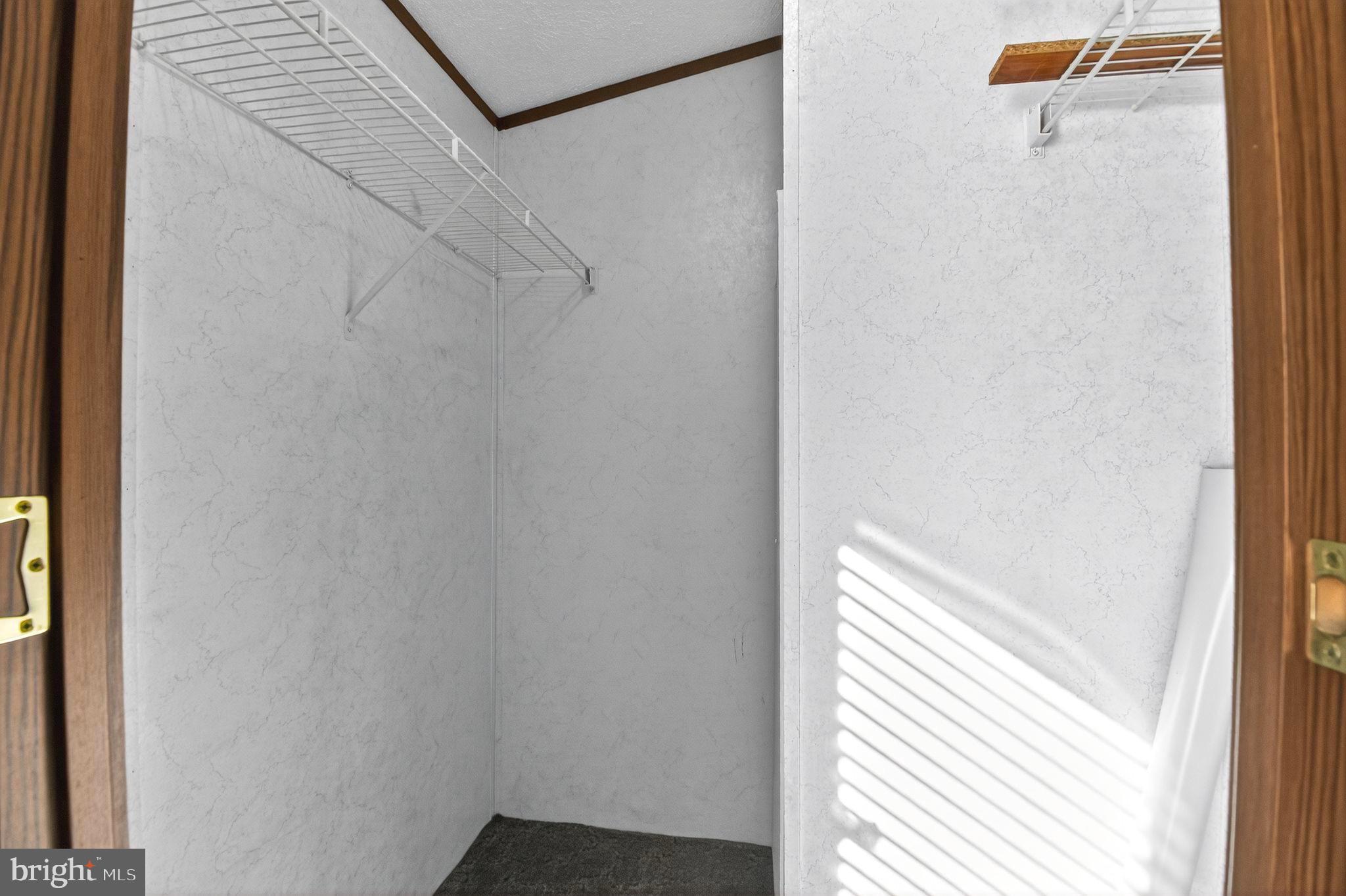 263 Konrad Morgan Way Lothian, MD 20711 - Photo 11 of 18 a view of a hallway