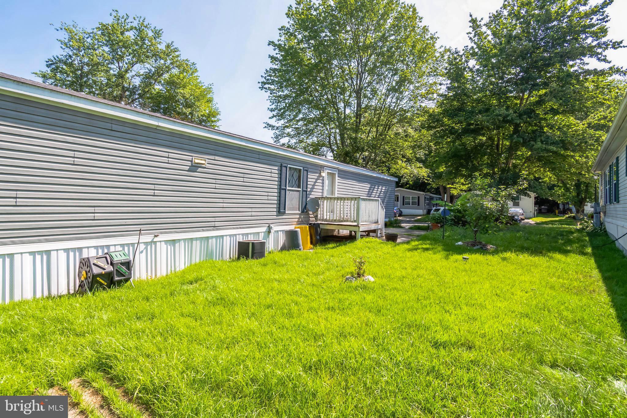 263 Konrad Morgan Way Lothian, MD 20711 - Photo 14 of 18 a house view with a backyard space