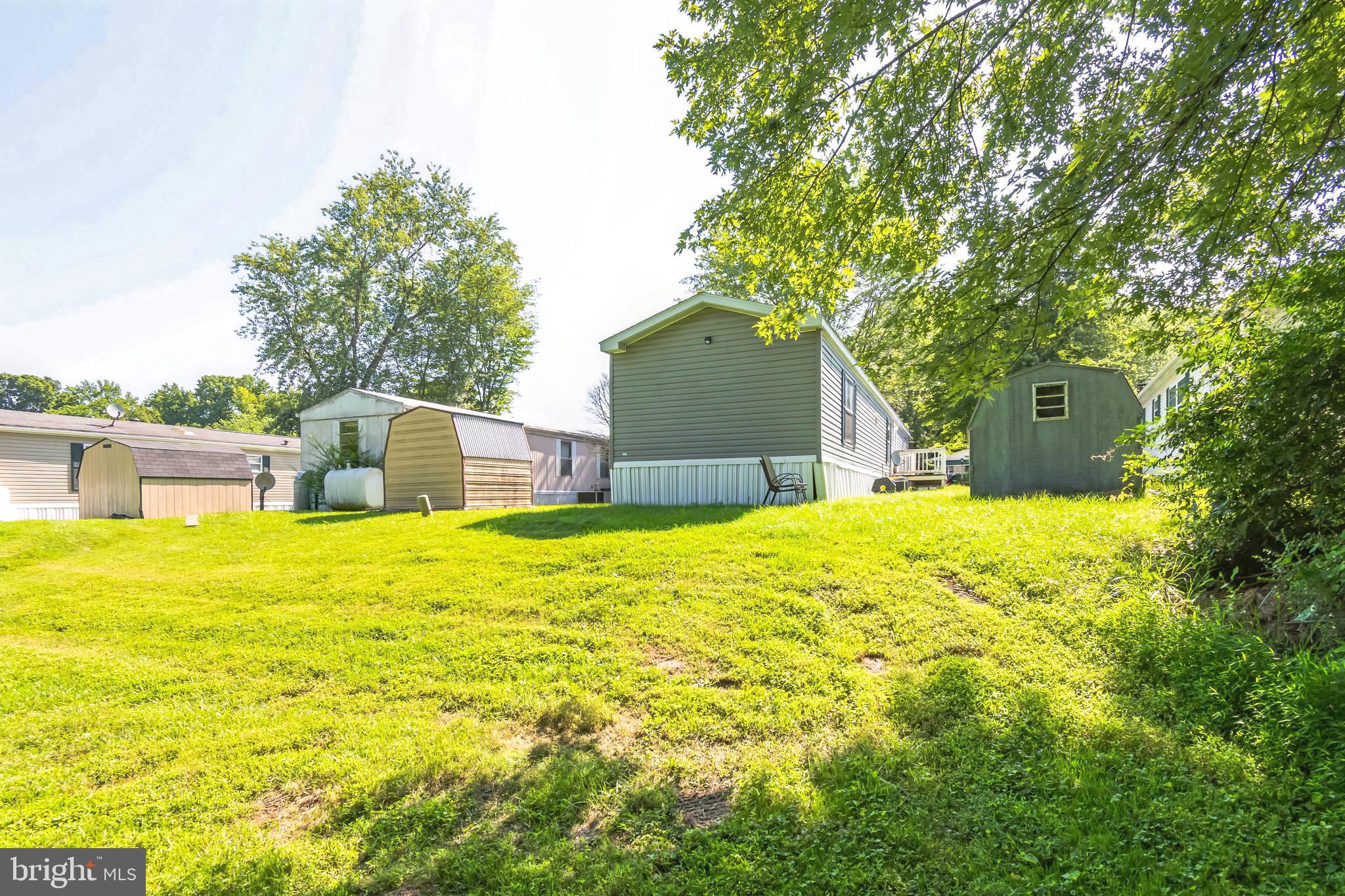 263 Konrad Morgan Way Lothian, MD 20711 - Photo 15 of 18 a house view with a outdoor space