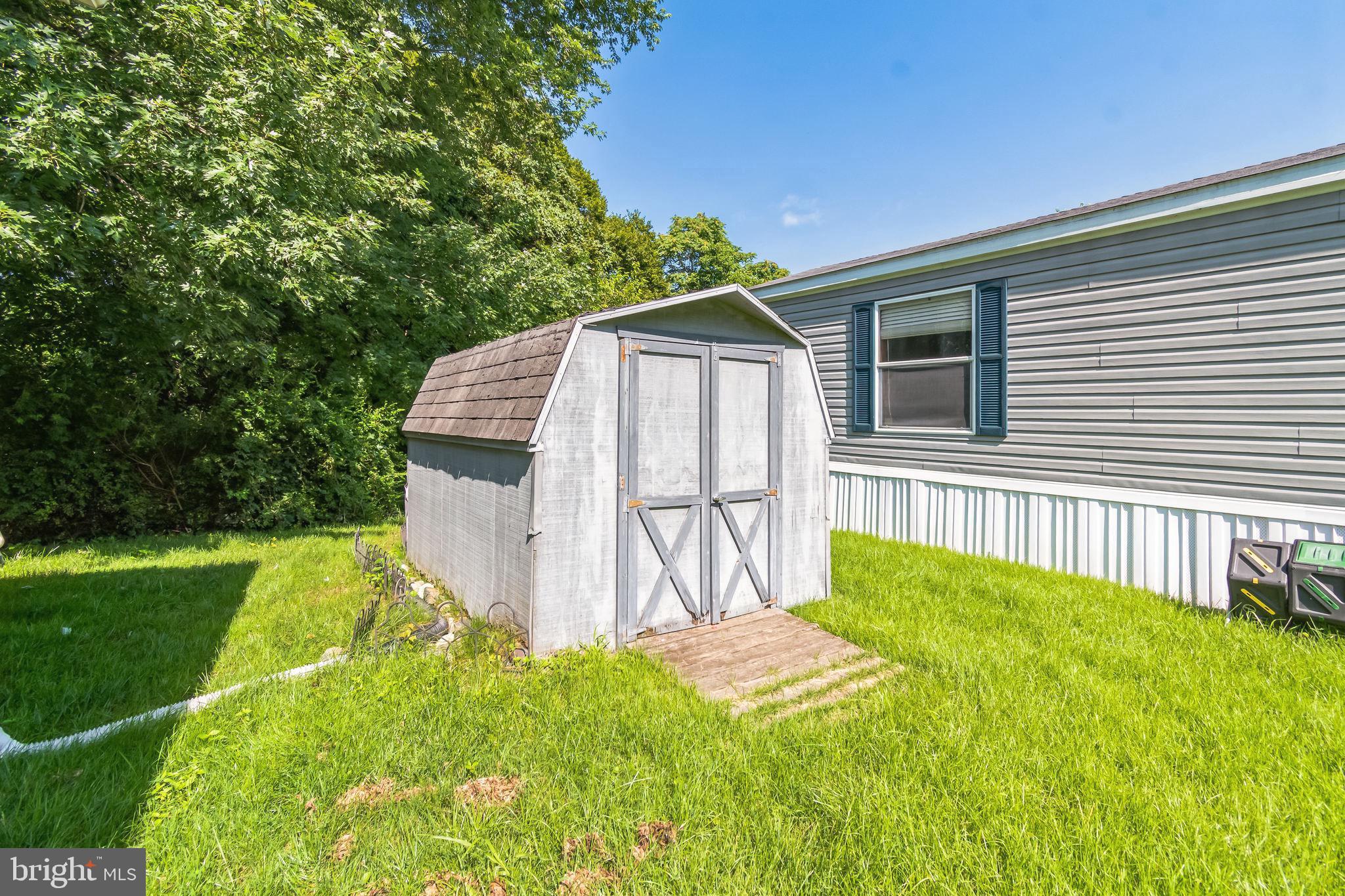 263 Konrad Morgan Way Lothian, MD 20711 - Photo 17 of 18 a view of backyard with deck