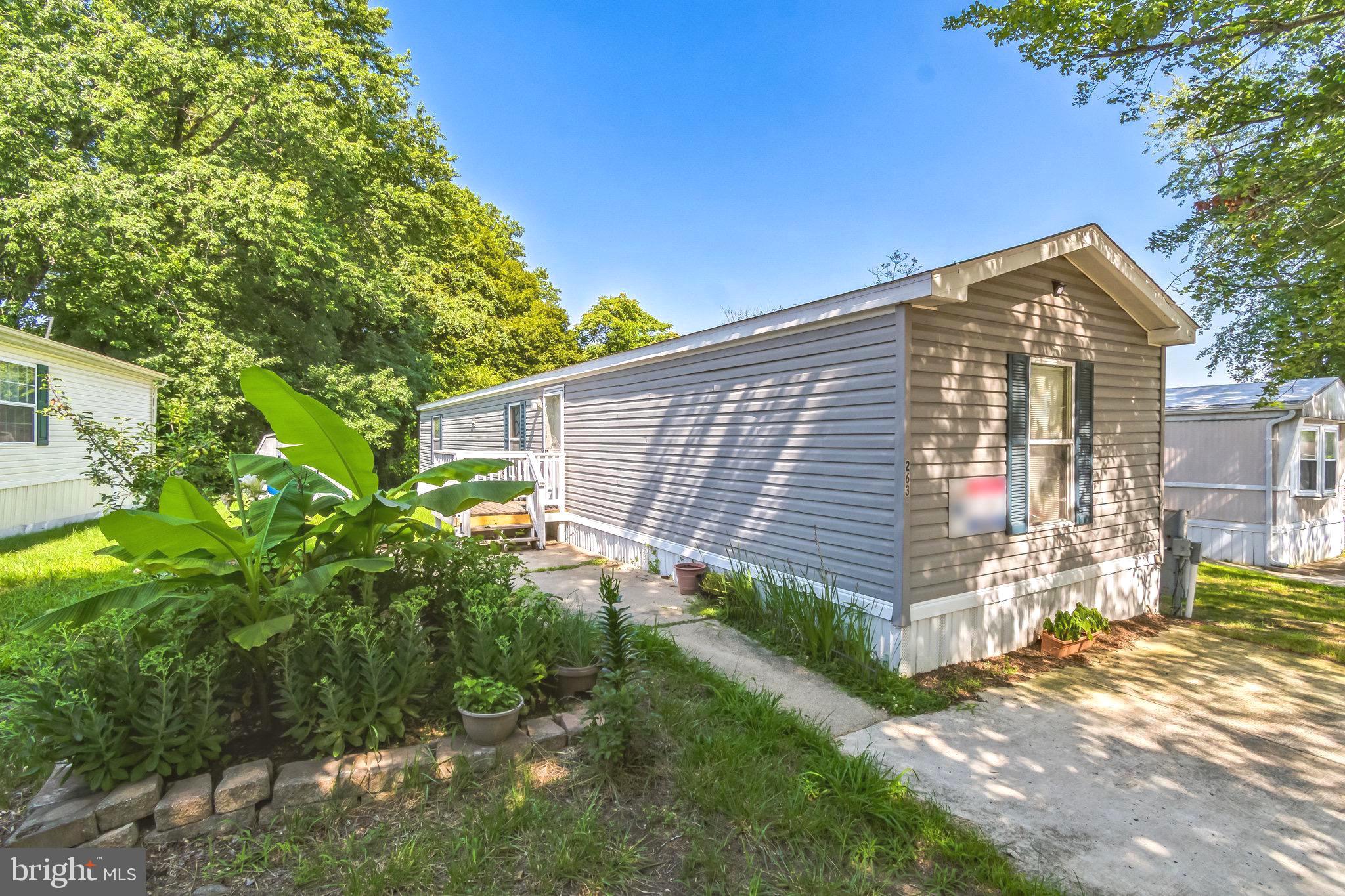 263 Konrad Morgan Way Lothian, MD 20711 - Photo 2 of 18 a view of a house with a yard