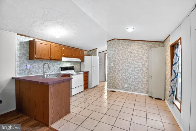 $64,999 | 263 Konrad Morgan Way, Lothian, MD 20711