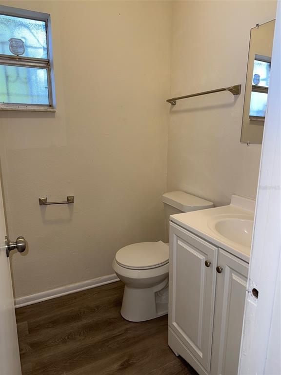 1740 West Walnut Street Tampa, FL 33607 - Photo 17 of 21 a bathroom with a toilet and a sink