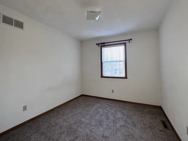 an empty room with closet