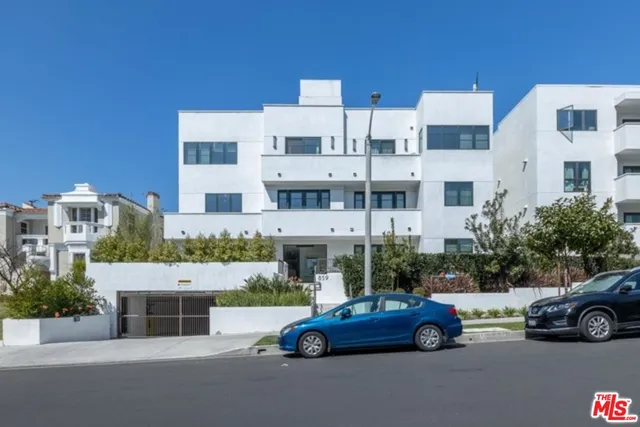 a car parked in front of a building