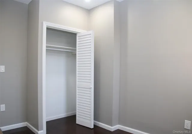 a view of a hallway with closet