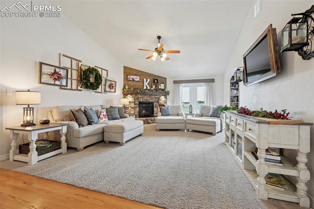 3430 Double Tree Court Colorado Springs, CO 80921 - Photo 13 of 50 a living room with furniture and a flat screen tv