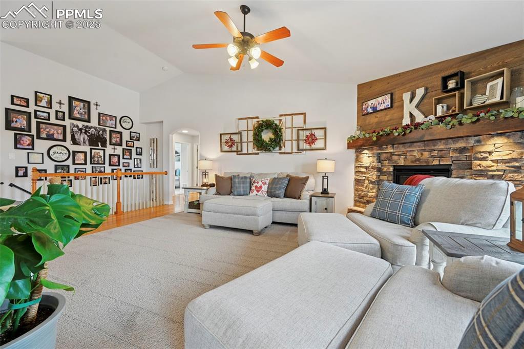 3430 Double Tree Court Colorado Springs, CO 80921 - Photo 16 of 50 a living room with furniture and a fireplace