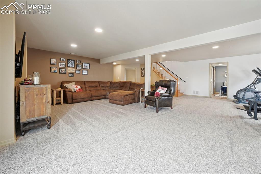 3430 Double Tree Court Colorado Springs, CO 80921 - Photo 38 of 50 a living room with furniture and a couch