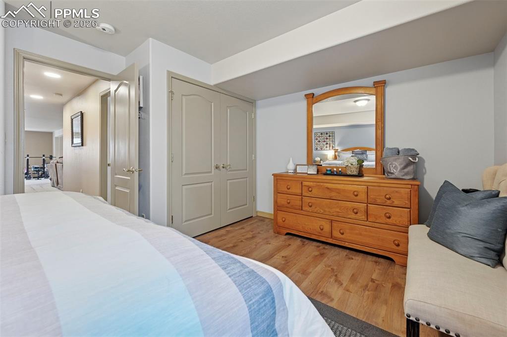 3430 Double Tree Court Colorado Springs, CO 80921 - Photo 42 of 50 a bedroom with a bed and a dresser