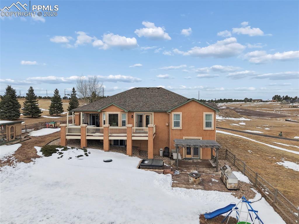 3430 Double Tree Court Colorado Springs, CO 80921 - Photo 8 of 50 a view of a house with a terrace