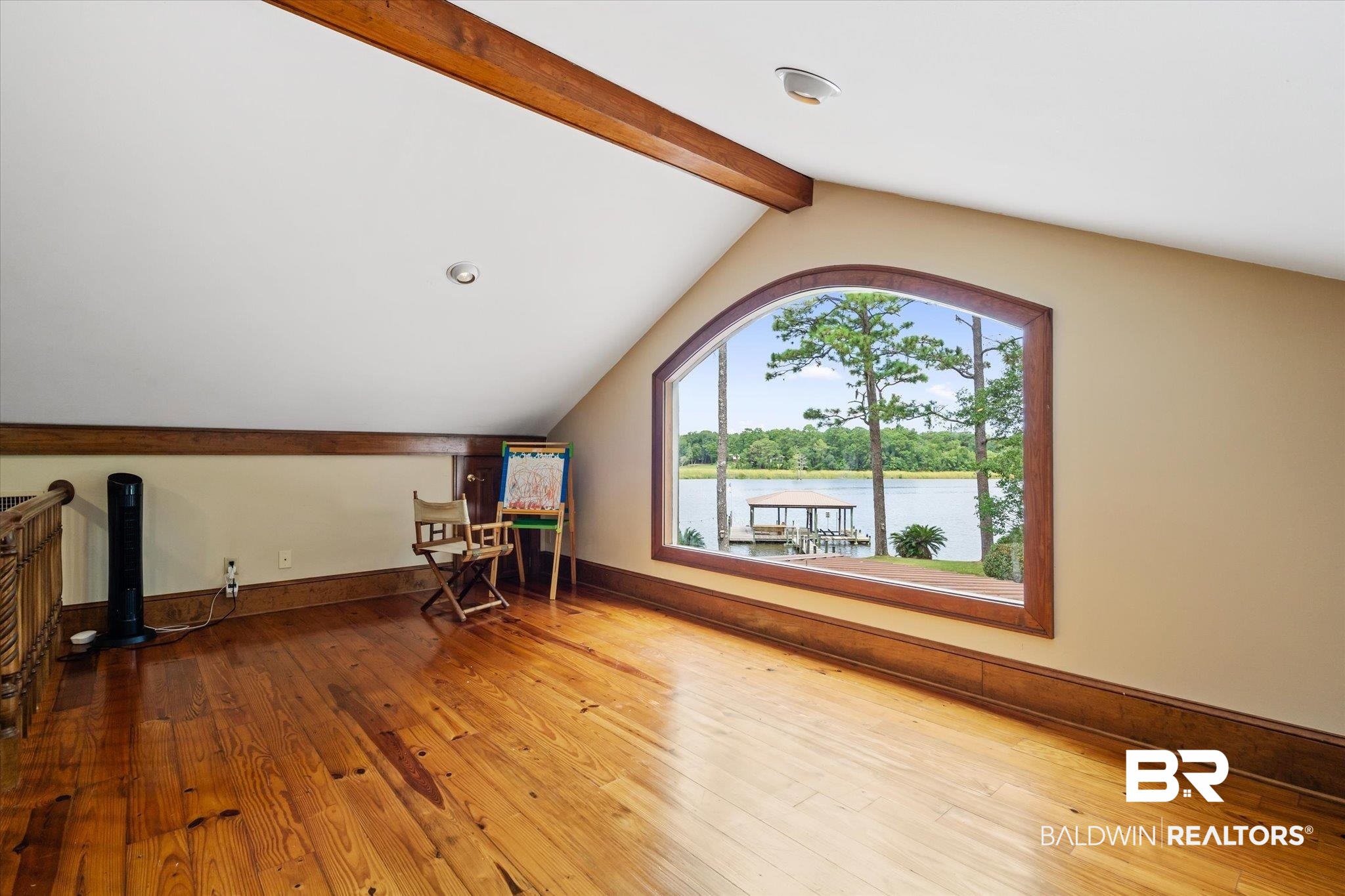2228 Riverside Drive Mobile, AL 36605 - Photo 11 of 51 Bonus room with a water view, hardwood / wood-style floors, and vaulted ceiling with beams