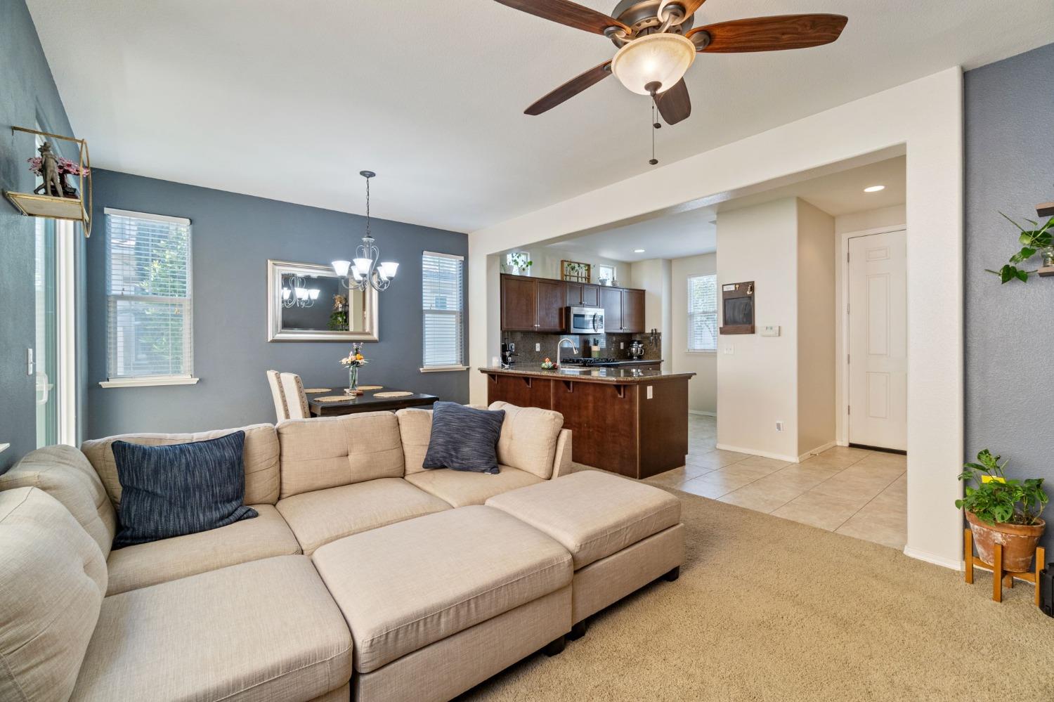 3915 Harlan Ranch Boulevard Clovis, CA 93619 - Photo 6 of 27 a bedroom with a large bed and furniture