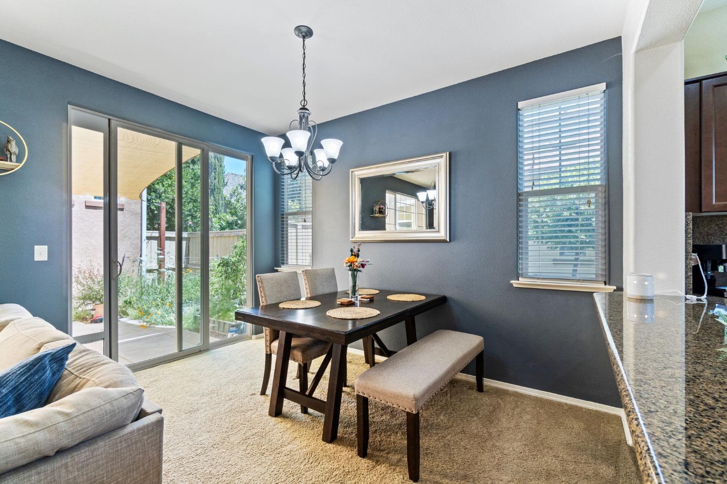 3915 Harlan Ranch Boulevard Clovis, CA 93619 - Photo 8 of 27 a dining room with furniture and window