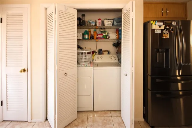 a view of a closet with storage
