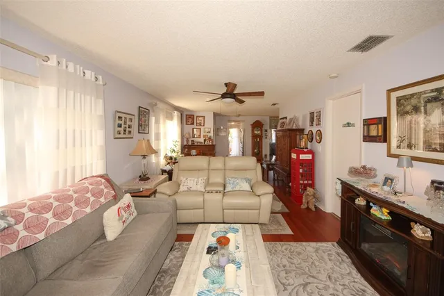 a bed room with a bed and a large mirror