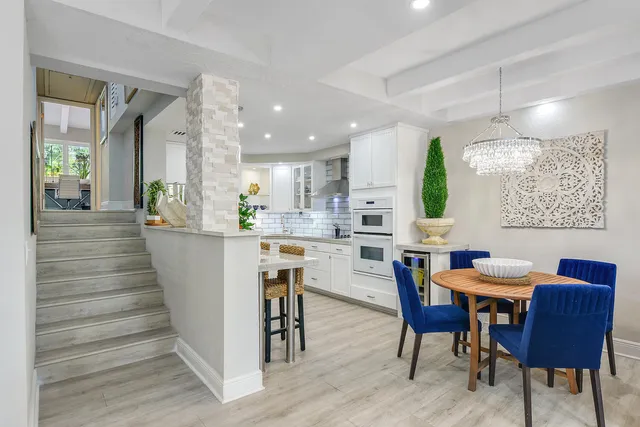 a view of a dining room with furniture