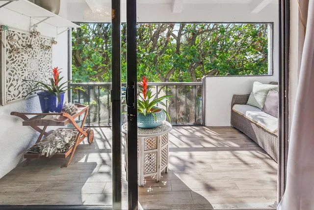 a view of a porch with furniture
