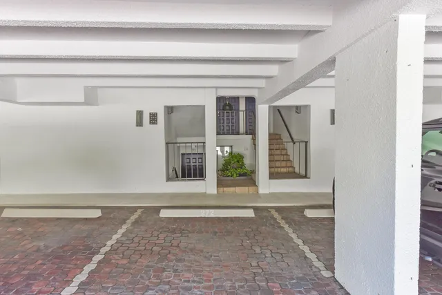 a view of a house with a street