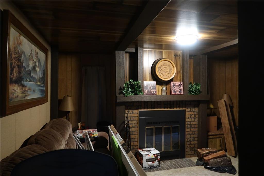 117 Esposito Road Mercer, PA 16137 - Photo 13 of 32 a living room with furniture and a fireplace