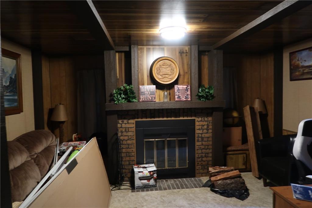 117 Esposito Road Mercer, PA 16137 - Photo 15 of 32 a living room with furniture and a fireplace