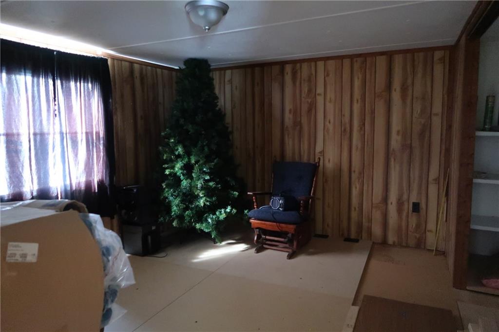 117 Esposito Road Mercer, PA 16137 - Photo 23 of 32 a living room with furniture and a fireplace