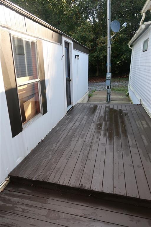117 Esposito Road Mercer, PA 16137 - Photo 7 of 32 a view of backyard with a wooden floor
