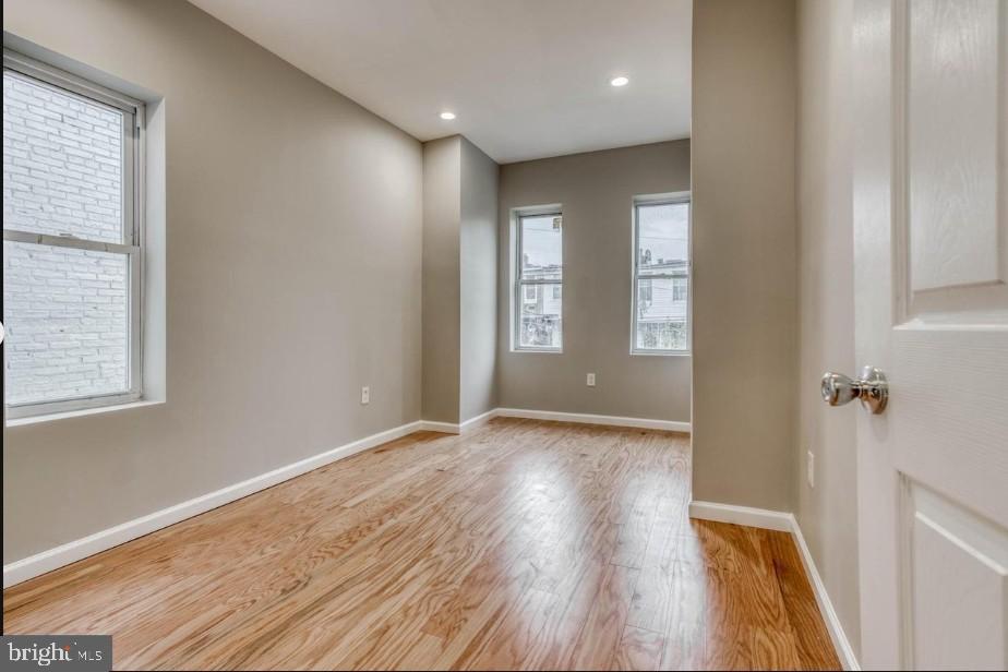 2409 Barclay Street Baltimore, MD 21218 - Photo 12 of 23 Bright and airy room with natural light.