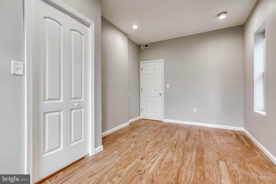 2409 Barclay Street Baltimore, MD 21218 - Photo 13 of 23 Spacious room with natural light and warmth.