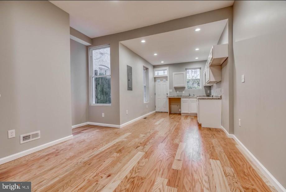2409 Barclay Street Baltimore, MD 21218 - Photo 4 of 23 Bright and airy open-concept living space.