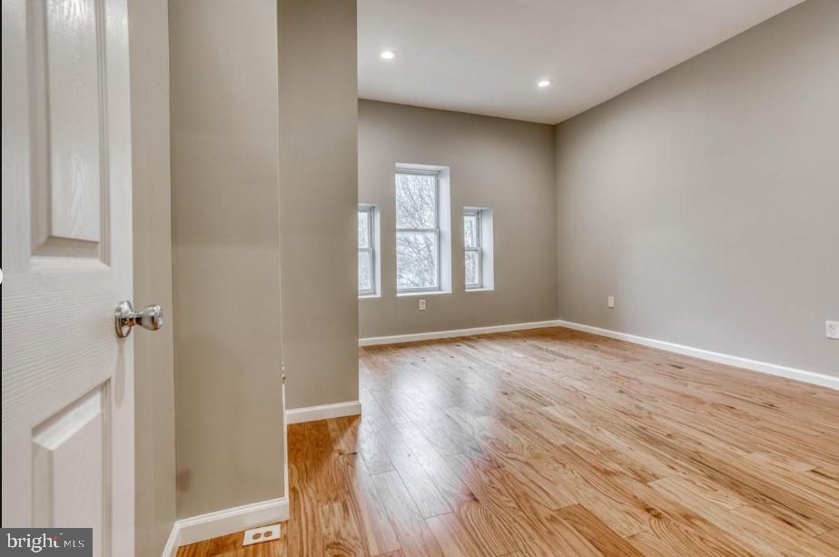 2409 Barclay Street Baltimore, MD 21218 - Photo 7 of 23 Bright and airy space with natural light.
