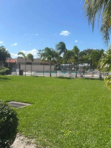 a view of a garden with an outdoor space
