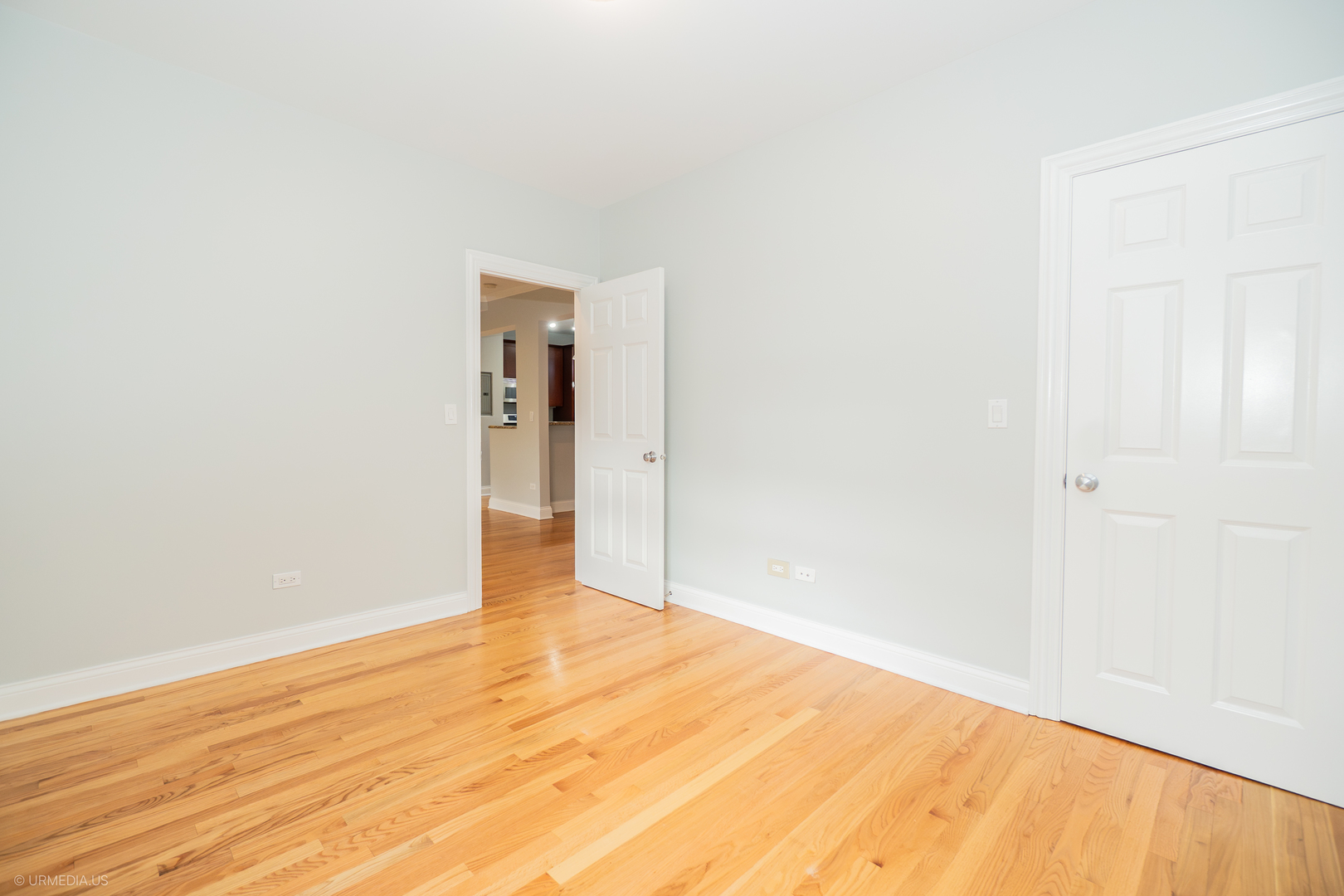 2608 West Leland Avenue, Unit 3 Chicago, IL 60625 - Photo 17 of 20 a view of empty room with wooden floor