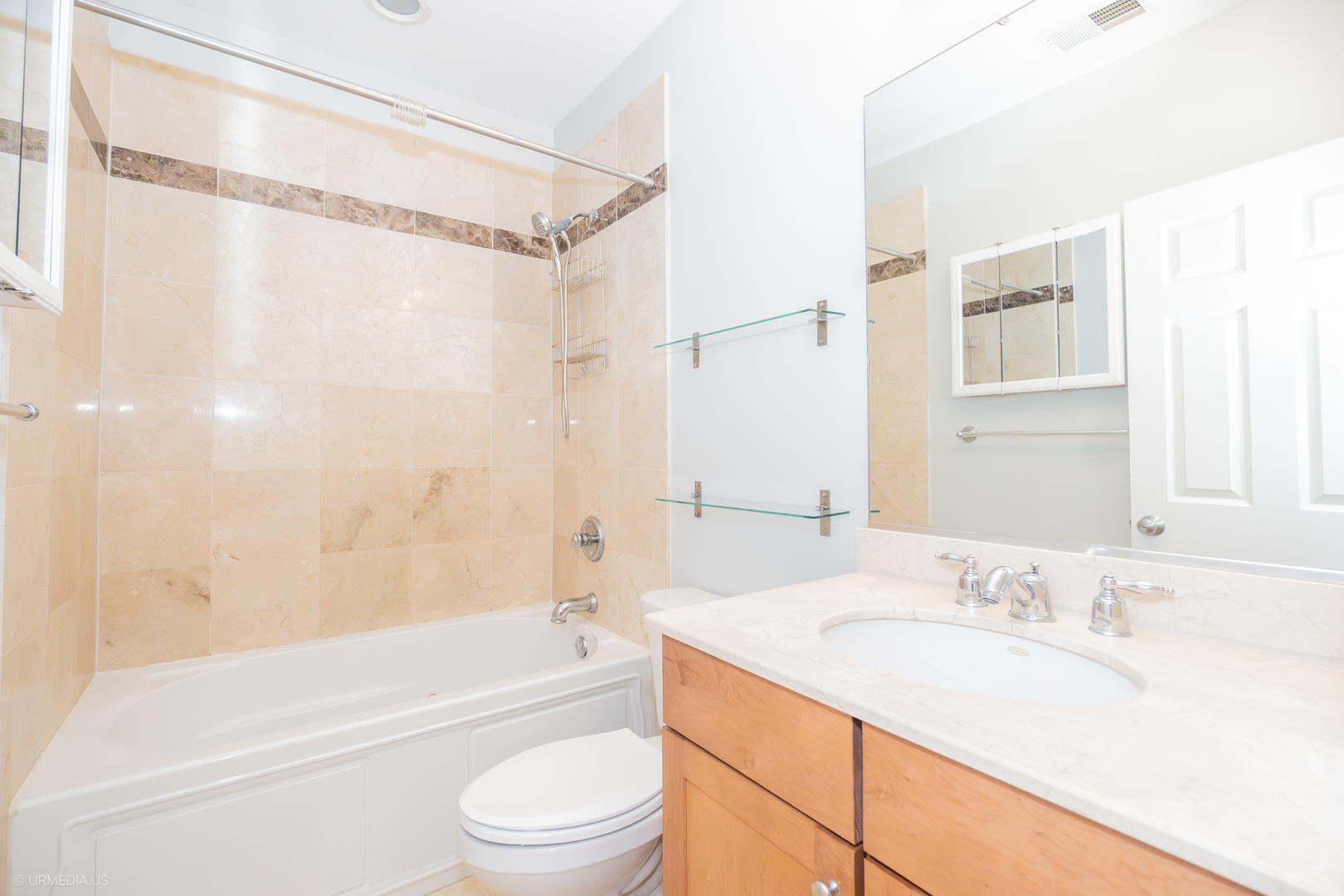 2608 West Leland Avenue, Unit 3 Chicago, IL 60625 - Photo 19 of 20 a bathroom with a granite countertop sink toilet and shower