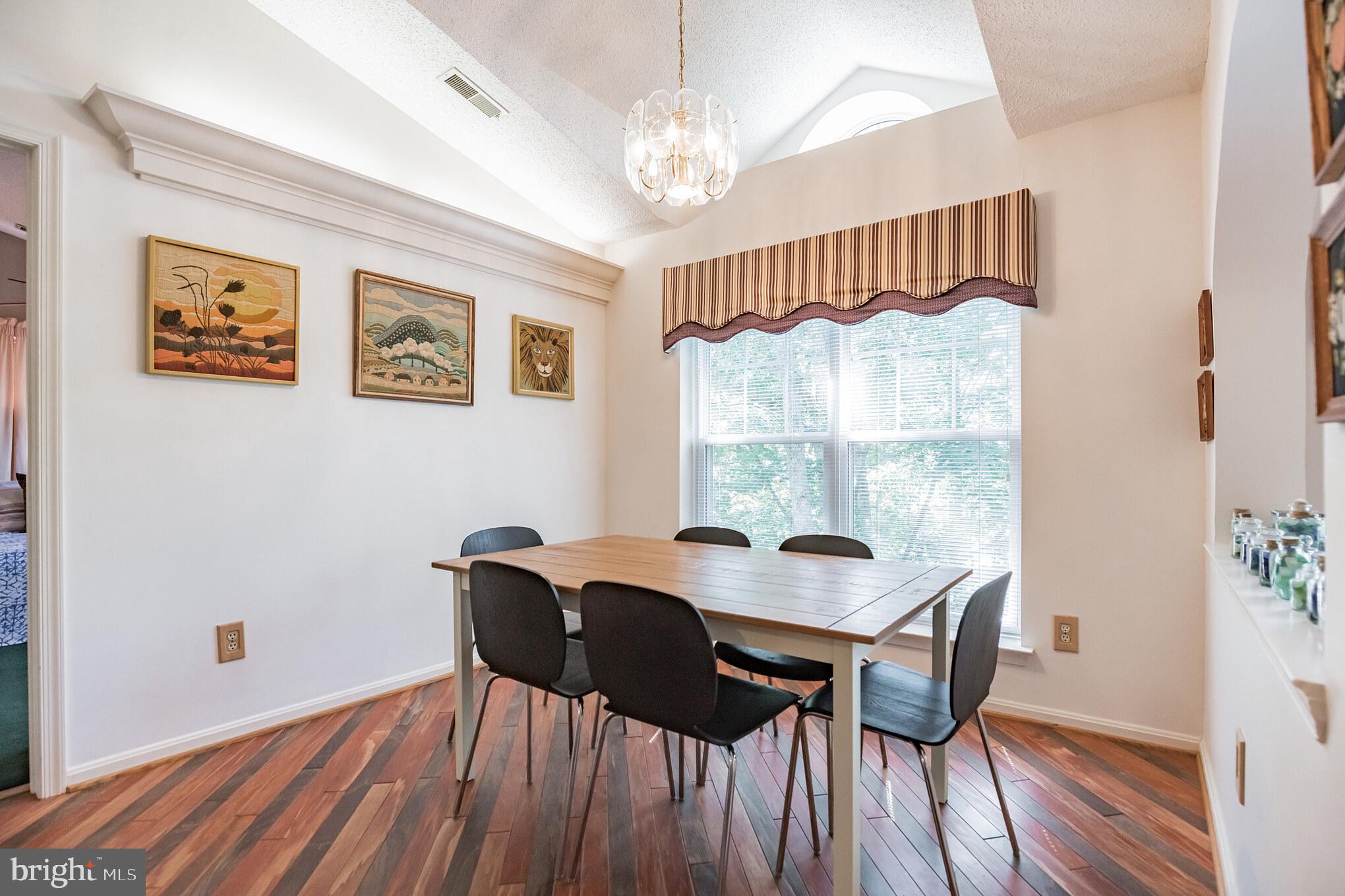 134 Square Rigger Way, Unit 134 Solomons, MD 20688 - Photo 15 of 32 Dining Room w/Hardwood Floors