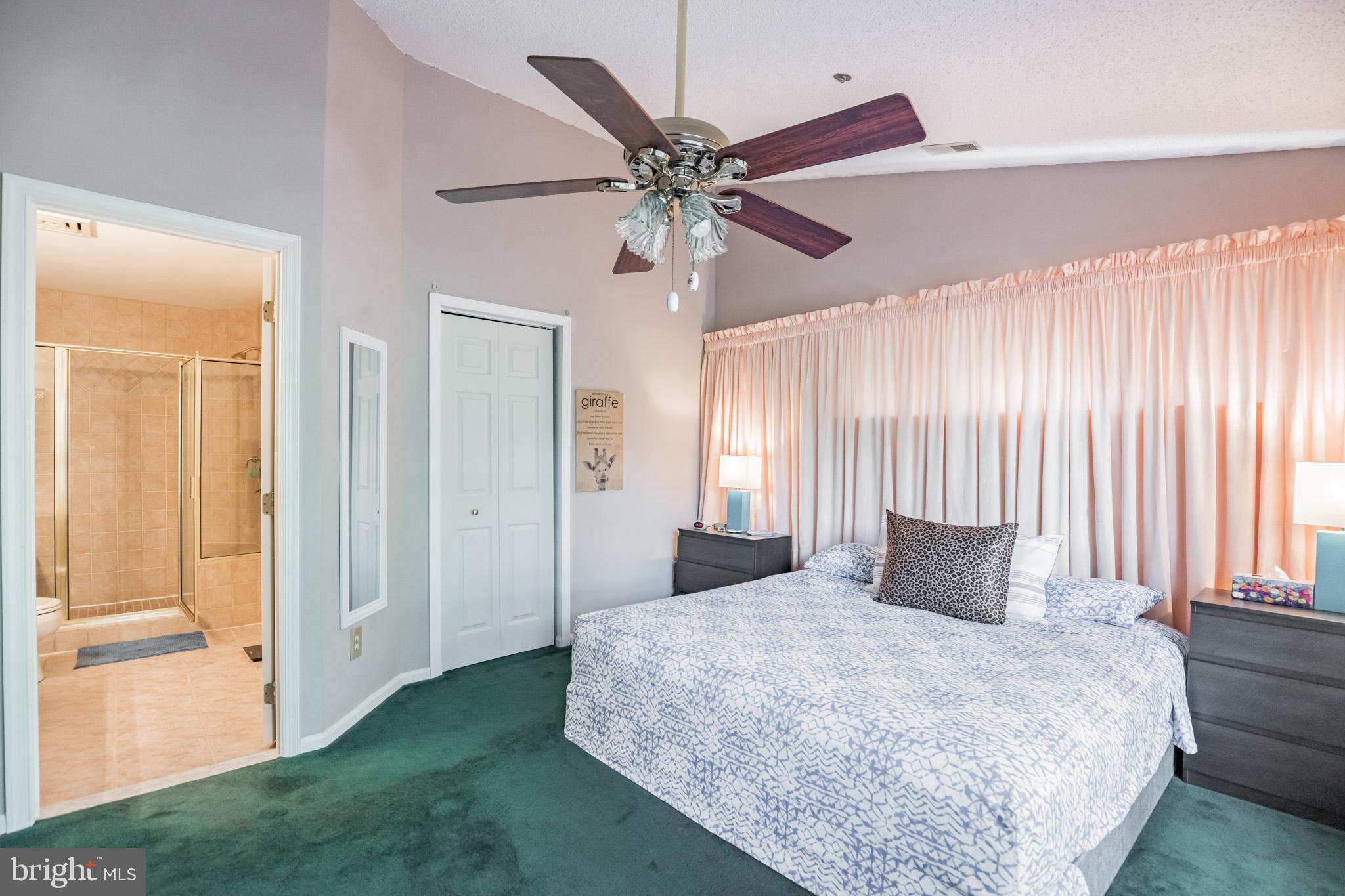 134 Square Rigger Way, Unit 134 Solomons, MD 20688 - Photo 19 of 32 Primary Bedroom w/ private bathroom