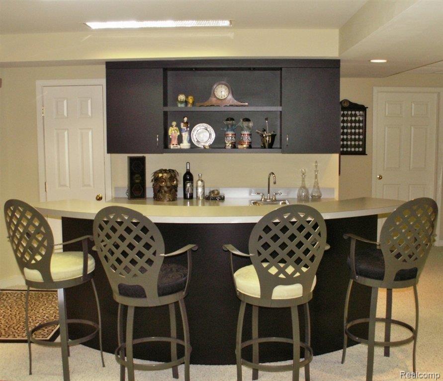 1450 Ridge Court Rochester, MI 48306 - Photo 10 of 22 WET BAR IN LOWER LEVEL