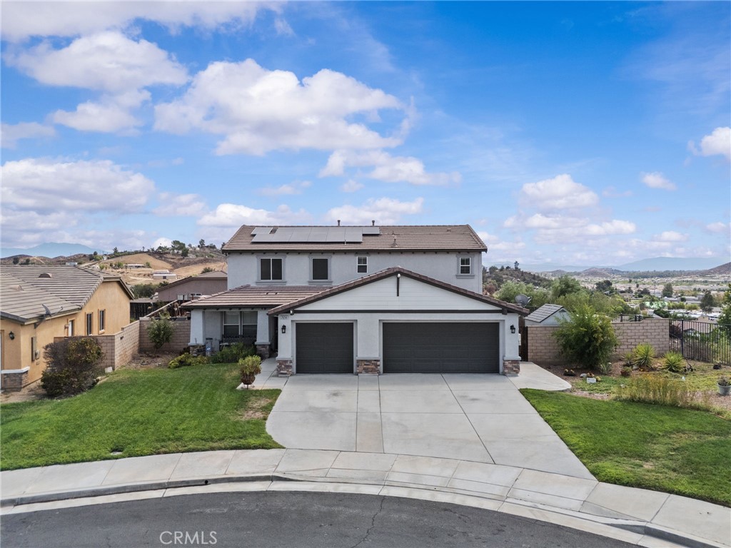 29266 Granite Ridge Court Menifee, CA 92587 - Photo 1 of 51 front view of a house with a yard