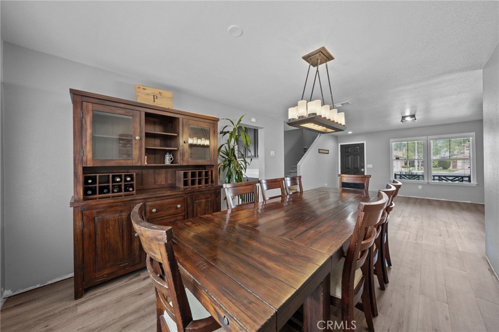 29266 Granite Ridge Court Menifee, CA 92587 - Photo 12 of 51 a dining room with furniture and window