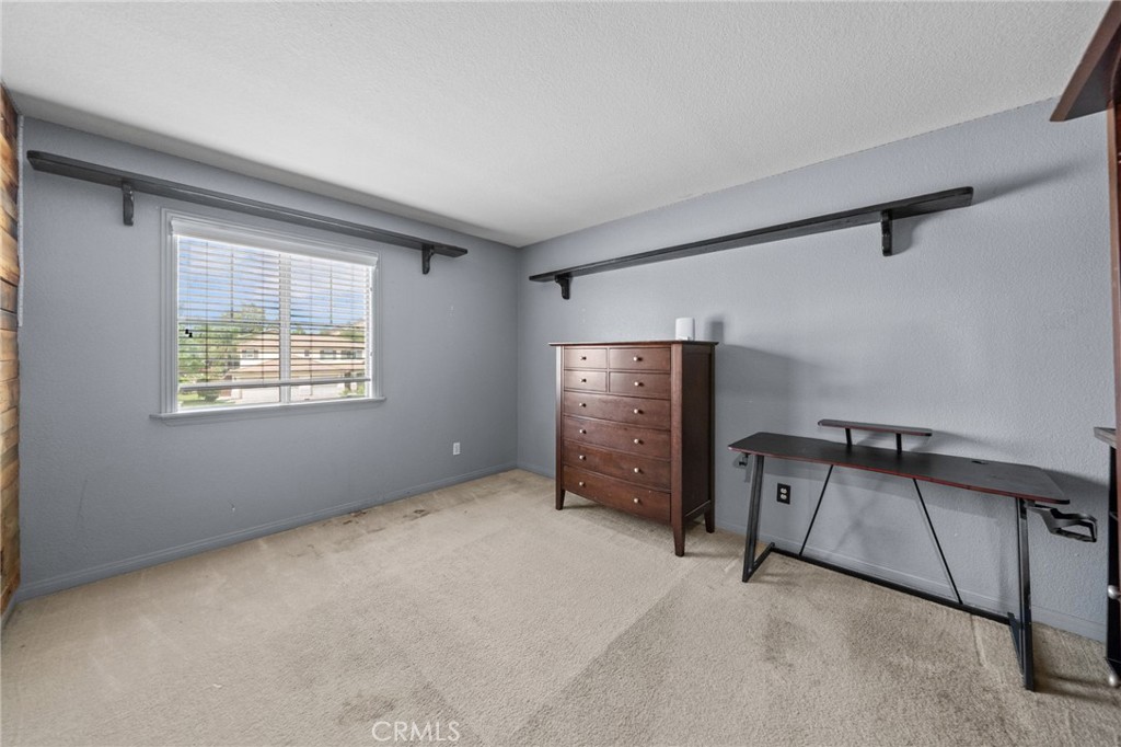 29266 Granite Ridge Court Menifee, CA 92587 - Photo 26 of 51 a view of an empty room with a window