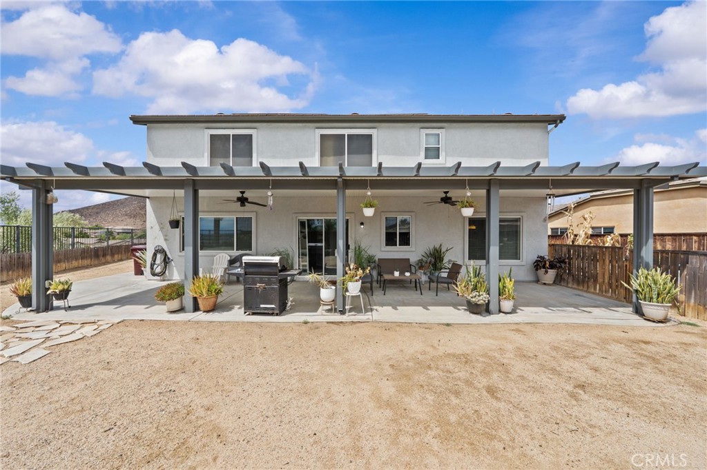 29266 Granite Ridge Court Menifee, CA 92587 - Photo 37 of 51 a view of house with outdoor seating