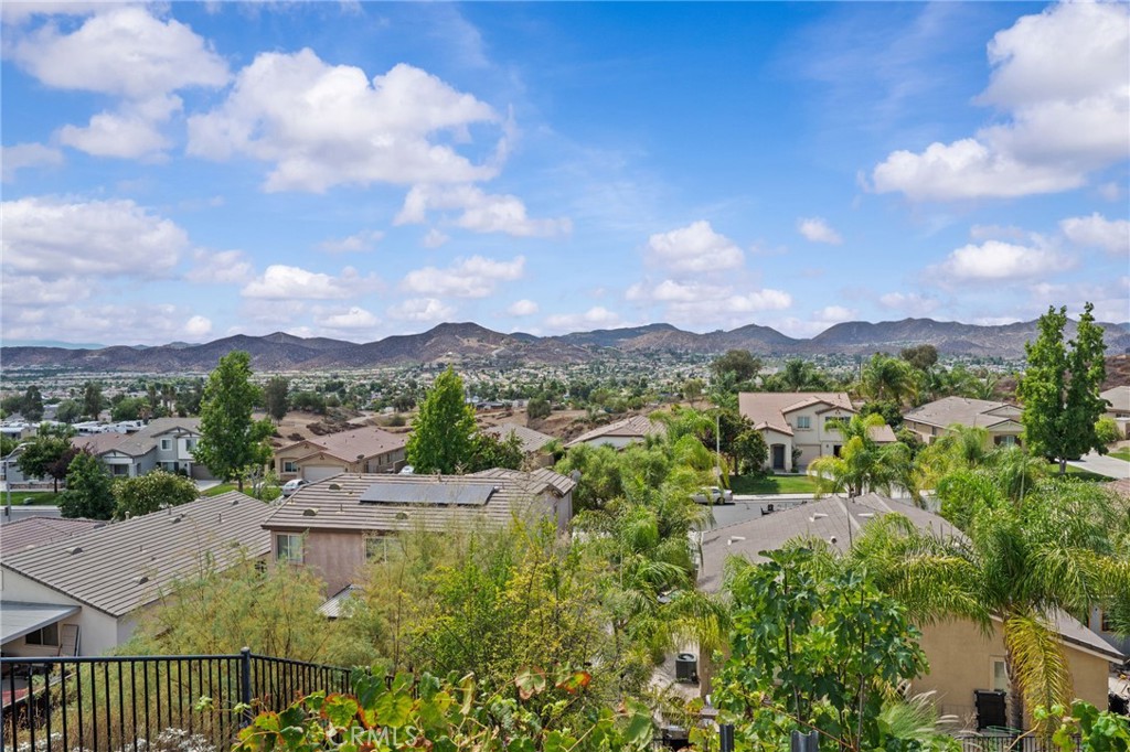 29266 Granite Ridge Court Menifee, CA 92587 - Photo 45 of 51 a view of a lake with a mountain in the background