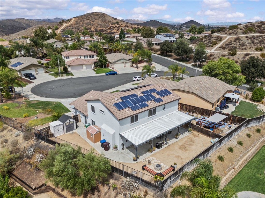 29266 Granite Ridge Court Menifee, CA 92587 - Photo 46 of 51 an aerial view of a house with a mountain