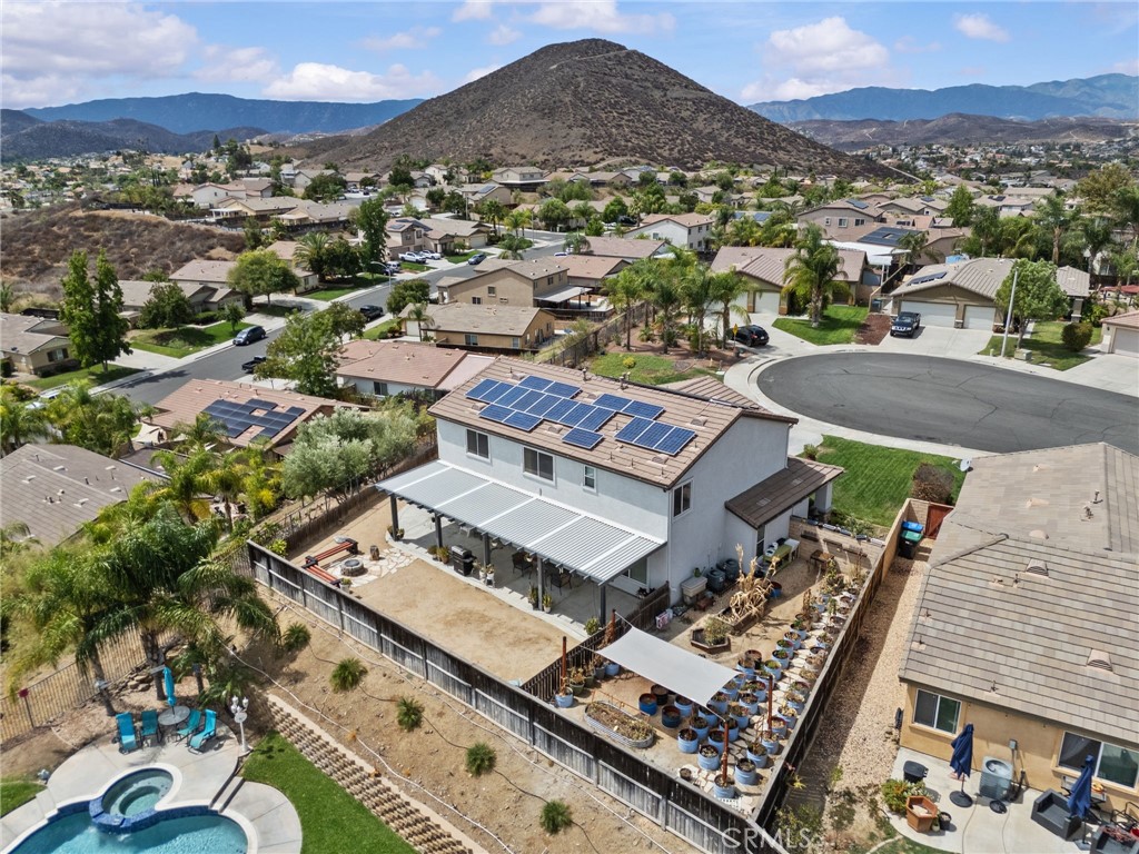 29266 Granite Ridge Court Menifee, CA 92587 - Photo 47 of 51 an aerial view of a house with a mountain